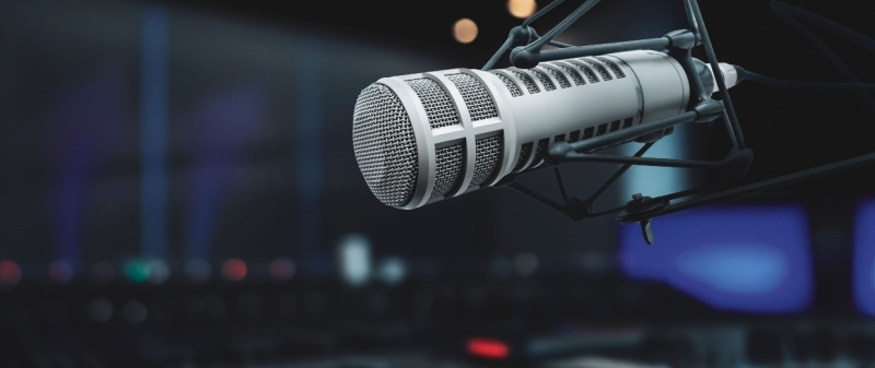 Decorative image - Microphone and console in radio studio