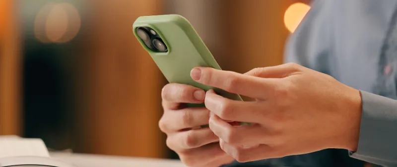 Decorative image - Person using mobile phone