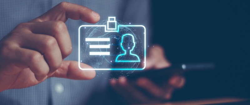 Decorative image - Person verifying digital ID on mobile phone