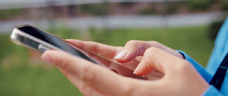 Hands on a mobile phone