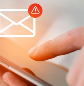 Decorative image - Person receiving text message with warning symbol