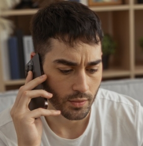Decorative image - Concerned man on phone