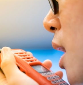 Decorative image - Man talking on walkie talkie
