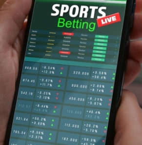 Decorative image - Person betting on phone