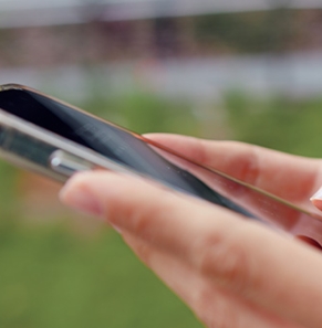 Hands on a mobile phone