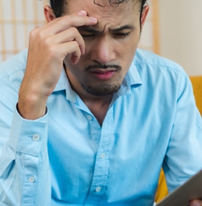 Person looking at a tablet