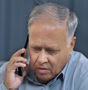 Decorative image - Concerned man on mobile phone
