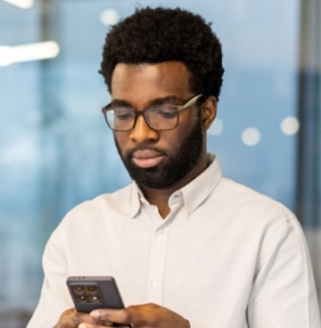 Decorative image - Person reading content on phone
