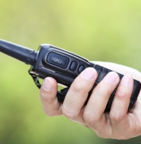 Decorative image - Person using walkie talkie