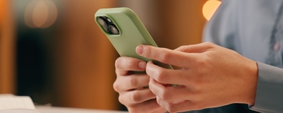 Decorative image - Person using mobile phone