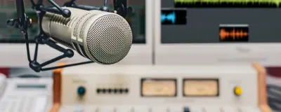 Decorative image - Radio studio with microphone and equipment