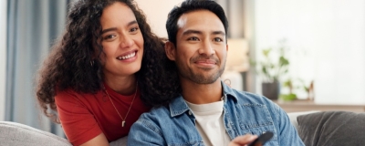 Decorative image - Happy couple watching TV