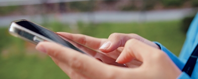 Hands on a mobile phone