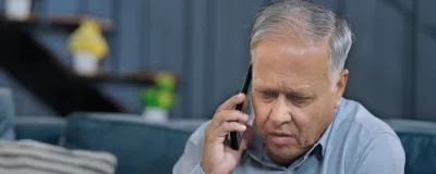 Decorative image - Concerned man on mobile phone