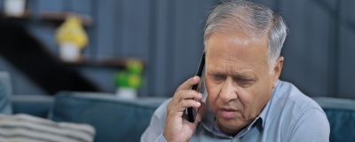 Decorative image - Concerned man on mobile phone