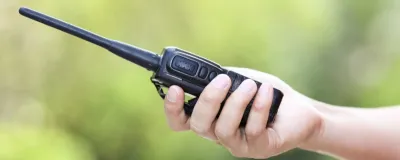 Decorative image - Person using walkie talkie