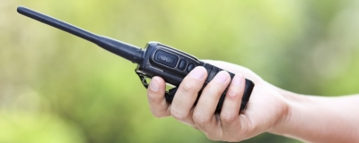 Decorative image - Person using walkie talkie