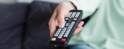 Decorative image - Woman holding TV remote